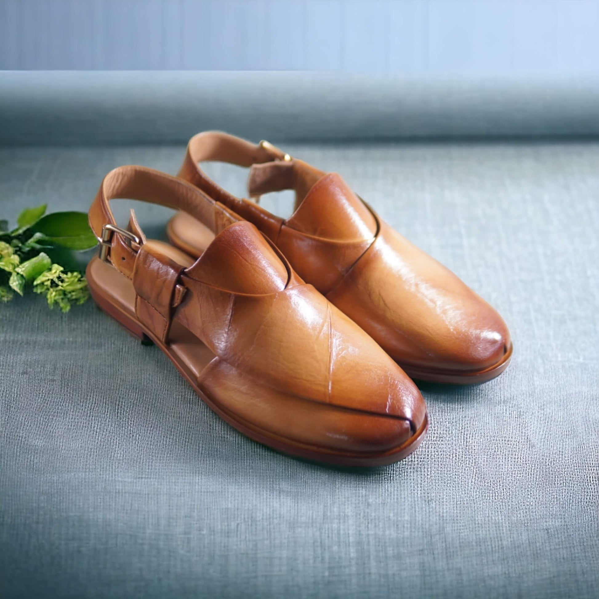 Introducing our handmade leather chappals, meticulously crafted for those who appreciate quality and style. Each pair is skillfully crafted by experienced artisans, ensuring durability and a unique touch. Made from genuine leather, these chappals promise both comfort and a timeless aesthetic. Elevate your footwear collection with the authenticity and craftsmanship of our handmade leather chappals.