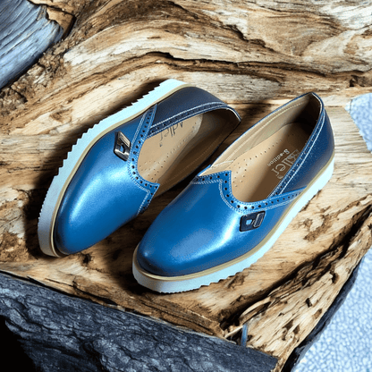 Step into comfort and style with our Azure Elegance Handmade Leather Moccasins. Crafted from the finest quality leather, each pair is meticulously designed by skilled artisans to ensure durability and elegance. The rich blue hue adds a unique touch, making them perfect for both casual outings and special occasions. Featuring a soft, cushioned insole and flexible outsole, these moccasins provide all-day comfort without sacrificing style. 