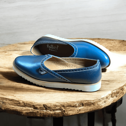 Step into comfort and style with our Azure Elegance Handmade Leather Moccasins. Crafted from the finest quality leather, each pair is meticulously designed by skilled artisans to ensure durability and elegance. The rich blue hue adds a unique touch, making them perfect for both casual outings and special occasions. Featuring a soft, cushioned insole and flexible outsole, these moccasins provide all-day comfort without sacrificing style. 