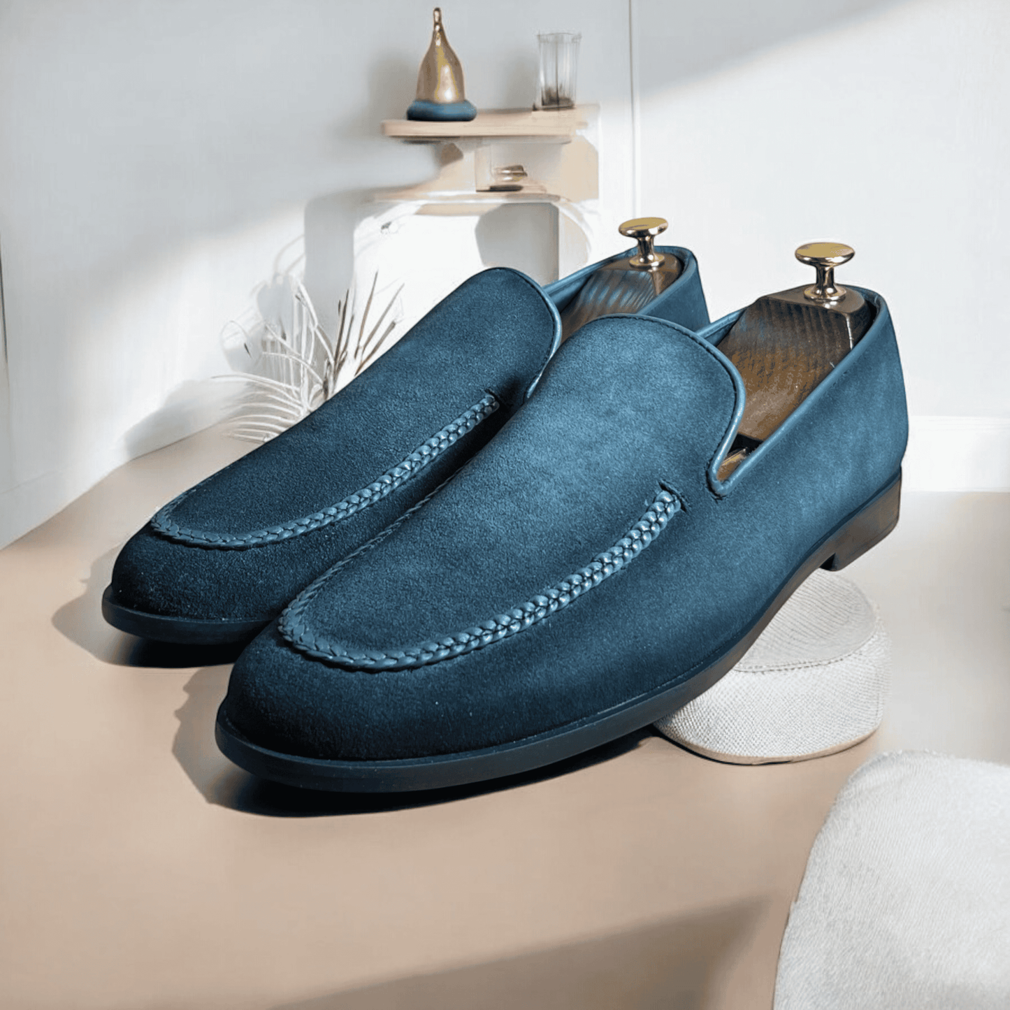 Introducing the Slate Luxe Suede Moccasins, where sophistication meets comfort. Crafted from premium grey suede, these handmade moccasins exude elegance with every step. The soft, supple leather molds to your feet, providing a perfect fit and unparalleled comfort. 