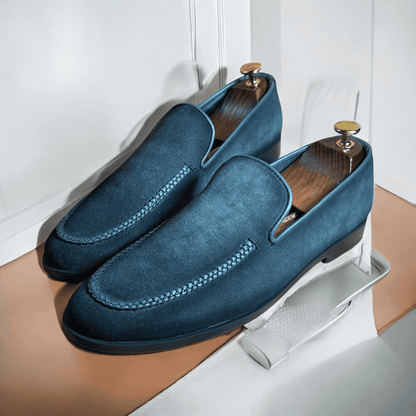 Introducing the Slate Luxe Suede Moccasins, where sophistication meets comfort. Crafted from premium grey suede, these handmade moccasins exude elegance with every step. The soft, supple leather molds to your feet, providing a perfect fit and unparalleled comfort. 