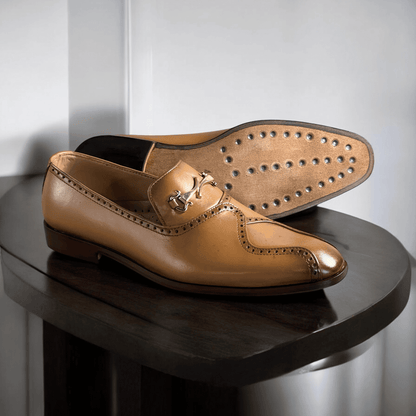 Designed for both comfort and style, the *Baymen* moccasins feature a soft leather lining, providing a smooth, breathable interior that molds to your foot for a personalized fit. The slip-on design offers convenience without sacrificing elegance, while the hand-stitched detailing adds a touch of refinement to every pair.